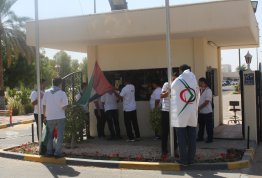 Scouts of AAU participated in changing flags of UAE & AAU as part of their plan for community service
