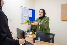 Distributing flowers in the International Women's Day 